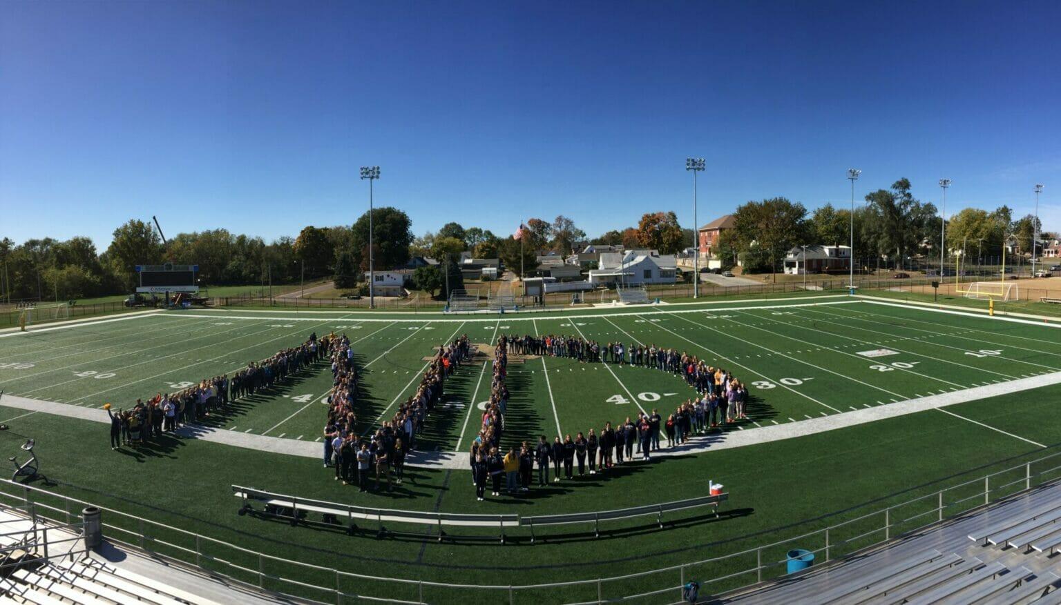 ND logo Students on field ND logo Students on field