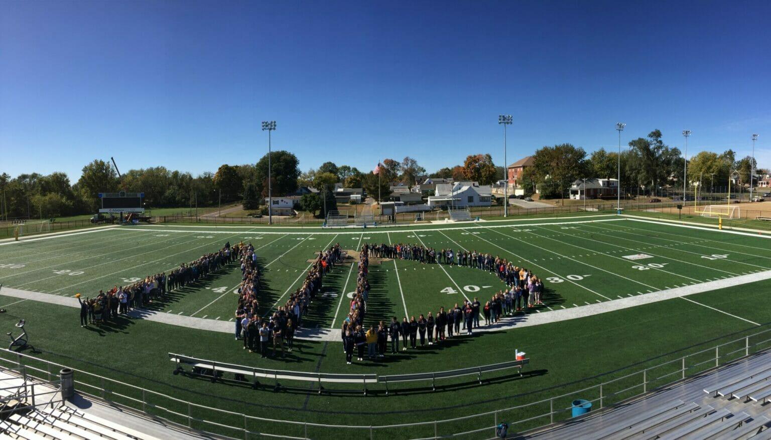 ND logo Students on field